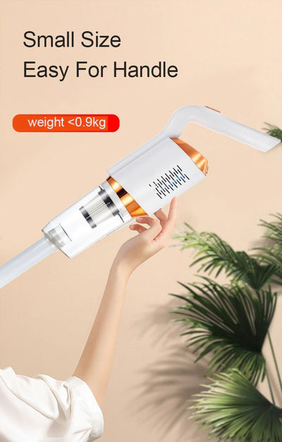 Hand holding a small device with text indicating it is easy to handle and weighs less than 0.9kg, against a beige background of home.