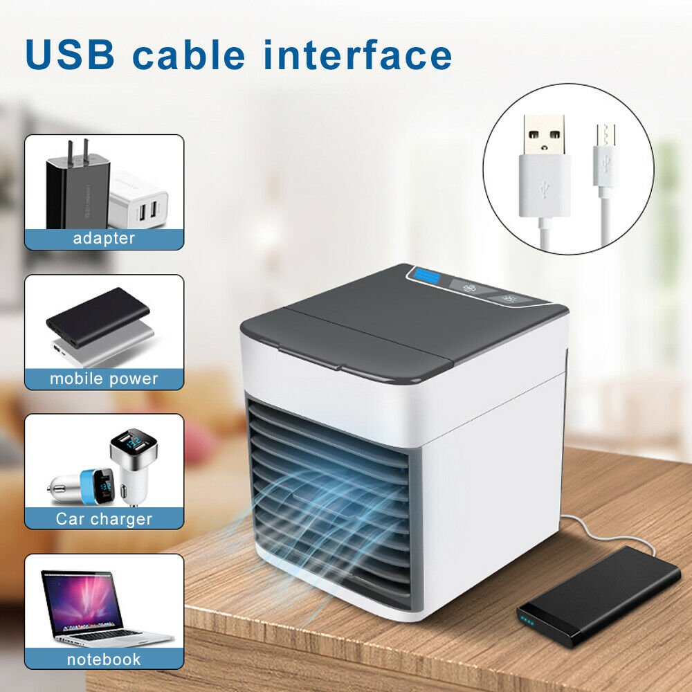 Portable air conditioner fan with USB cable interface on a wooden surface